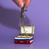 Graduation Bear Trinket Box opened to show white ceramic interior and metal hinge with keychain inside